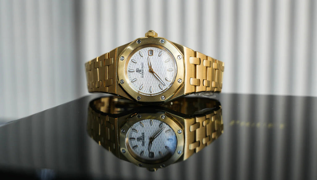 Audemars Piguet Royal Oak Lady 67600BA Yellow Gold Cream Dial - Angle View by Audemars Piguet