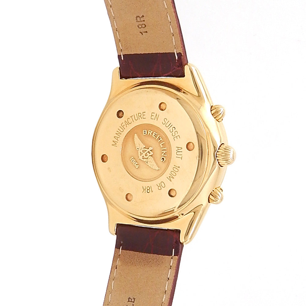 Breitling Chrono Cockpit K30012 18k Yellow Gold White Dial - Wrist / Lifestyle View by Breitling